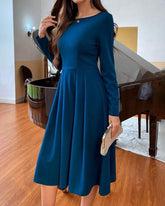 Elegant fast färgklänning